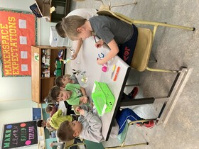 Students crafting caterpillars