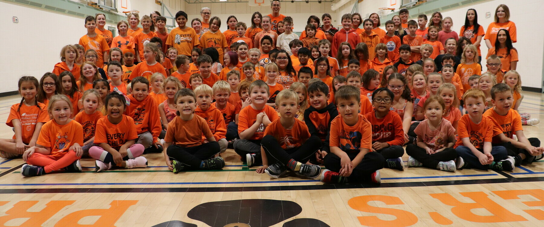 Students wearing their orange shirts